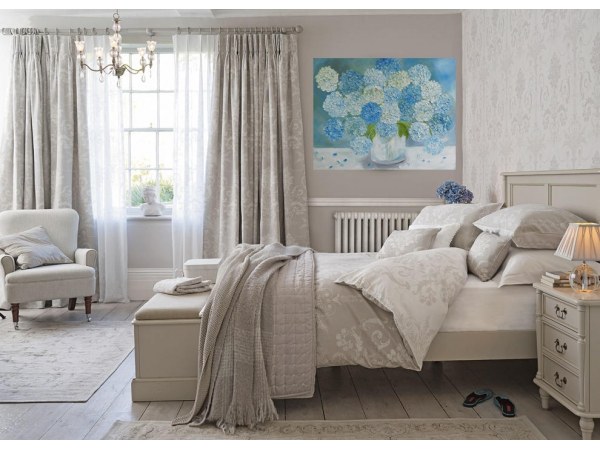 bedroom with hydrangea painting