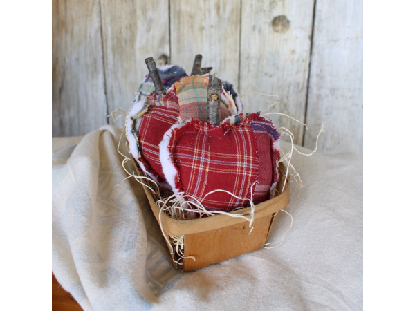 quilted apples in a vintage fruit basket