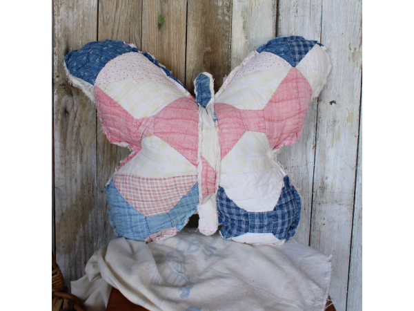 Butterfly old quilted pillow