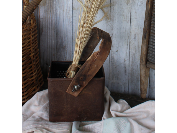 primitive rusted metal basket