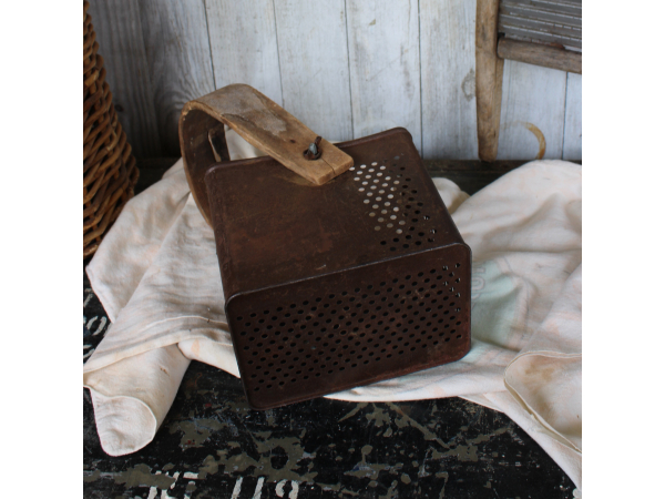 antique metal basket, wooden handle