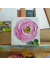 pink ranunculus  painting on a easel