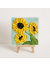 small sunflower painting on a easel